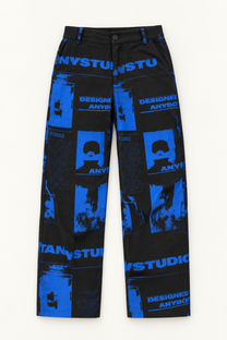 Black wide-leg pants with cobalt blue graphic collage print, flat lay