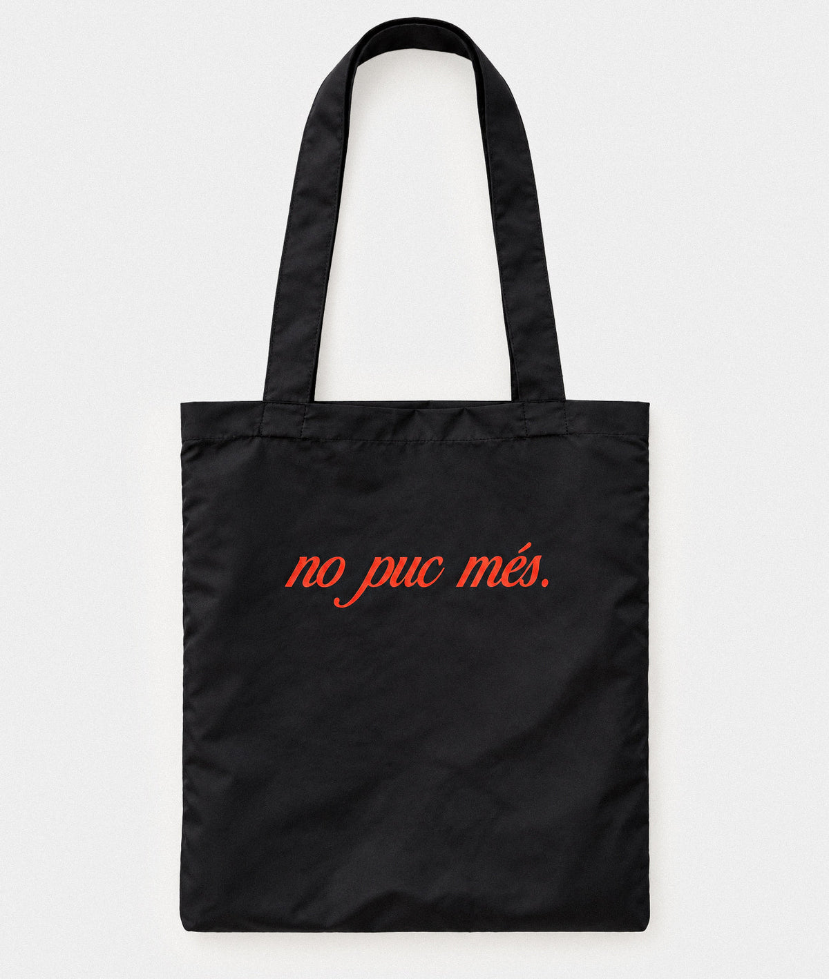 No puc més tote bag, black with orange-red lettering