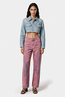 Pink denim pants styled with a blue denim jacket