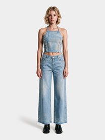 Blue denim wide-leg jeans by Colmillo de Morsa, front view