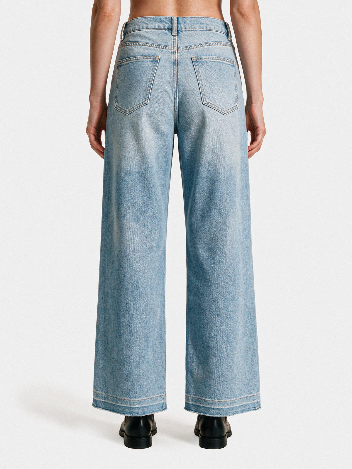 Blue denim wide-leg jeans, back view