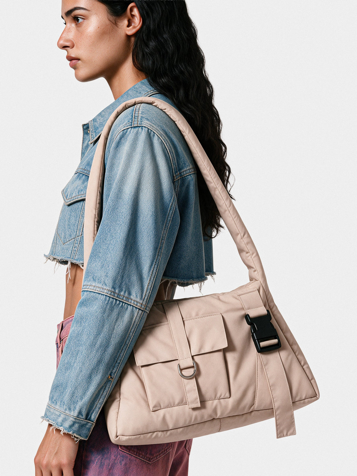 Cropped blue denim trucker jacket, side view