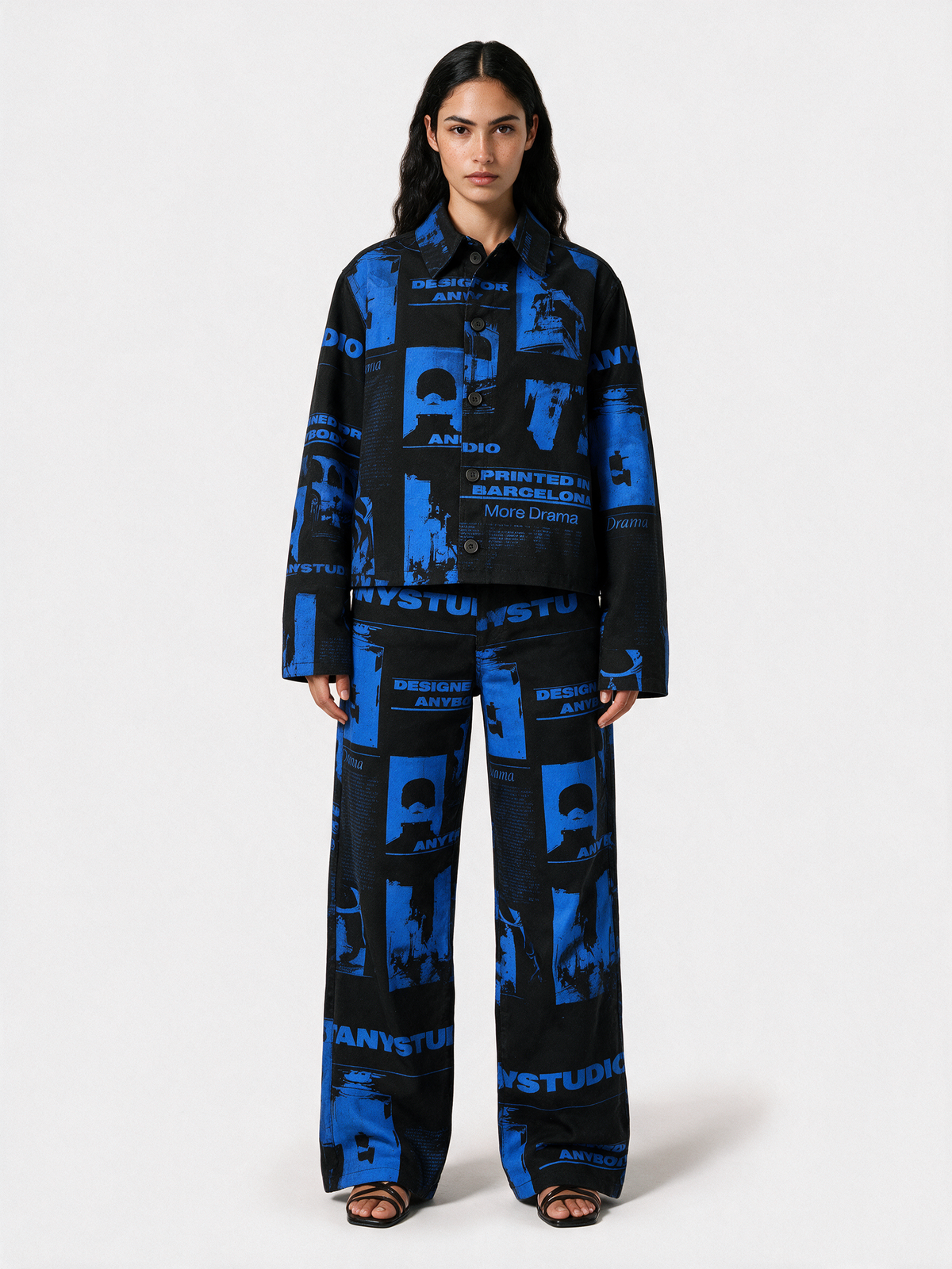 Model wearing the printed pants with matching printed jacket