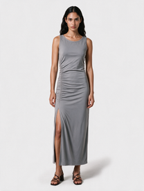 Model wearing the grey ruched side maxi dress, front view
