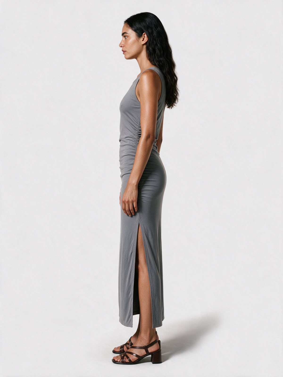 Grey ruched side maxi dress, side view with high slit