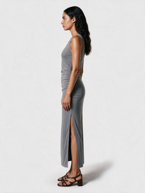Grey ruched side maxi dress, side view with high slit