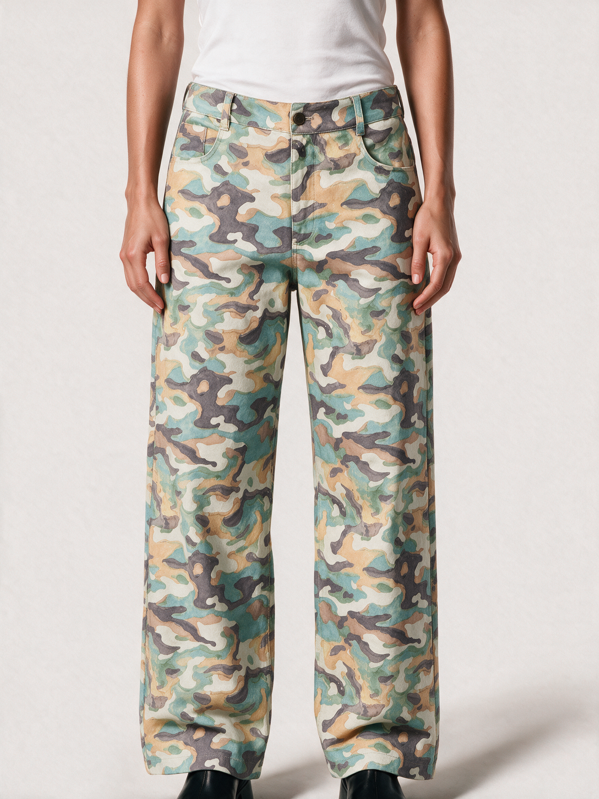 Model wearing the camouflage pants, front view